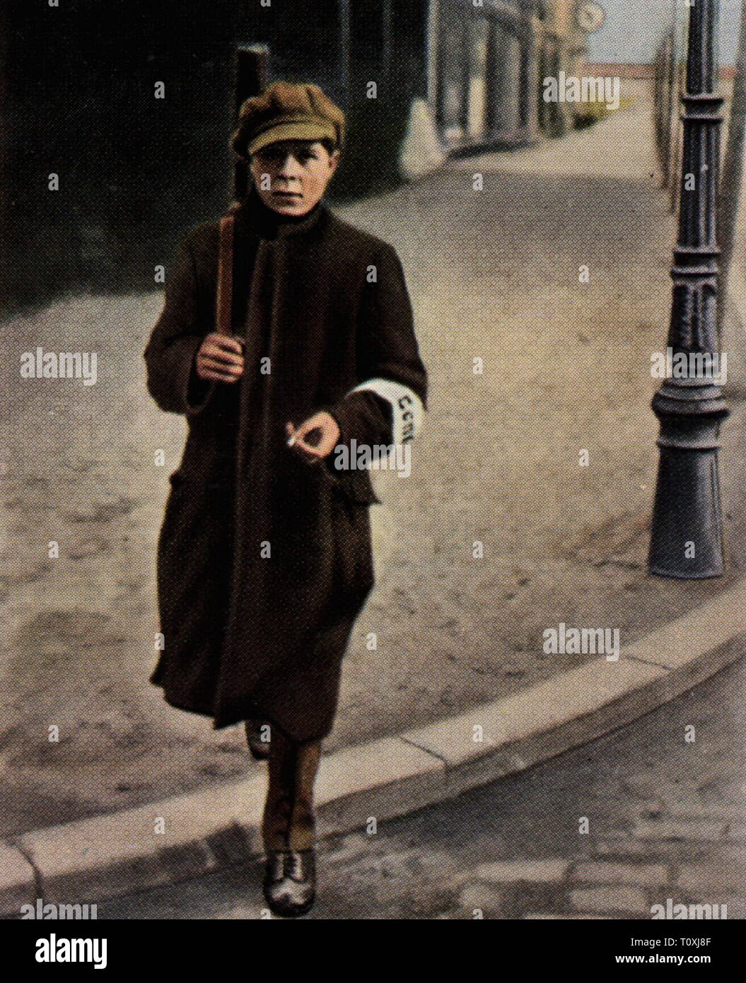 Ruhr Uprising 1920, sentry of the Red Ruhr Army, March 1920, coloured photograph, cigarette card, series 'Die Nachkriegszeit', 1935, March uprising, Ruhr conflict, Red Army, communist, communists, Ruhr area, Ruhr Valley, Free State of Prussia, Rhine Province, people, Germany, German Reich, Third Reich, Weimar Republic, 1920s, 20th century, guard duty, watch duty, coloured, colored, post war period, post-war period, post-war years, post-war era, historic, historical, Additional-Rights-Clearance-Info-Not-Available Stock Photo
