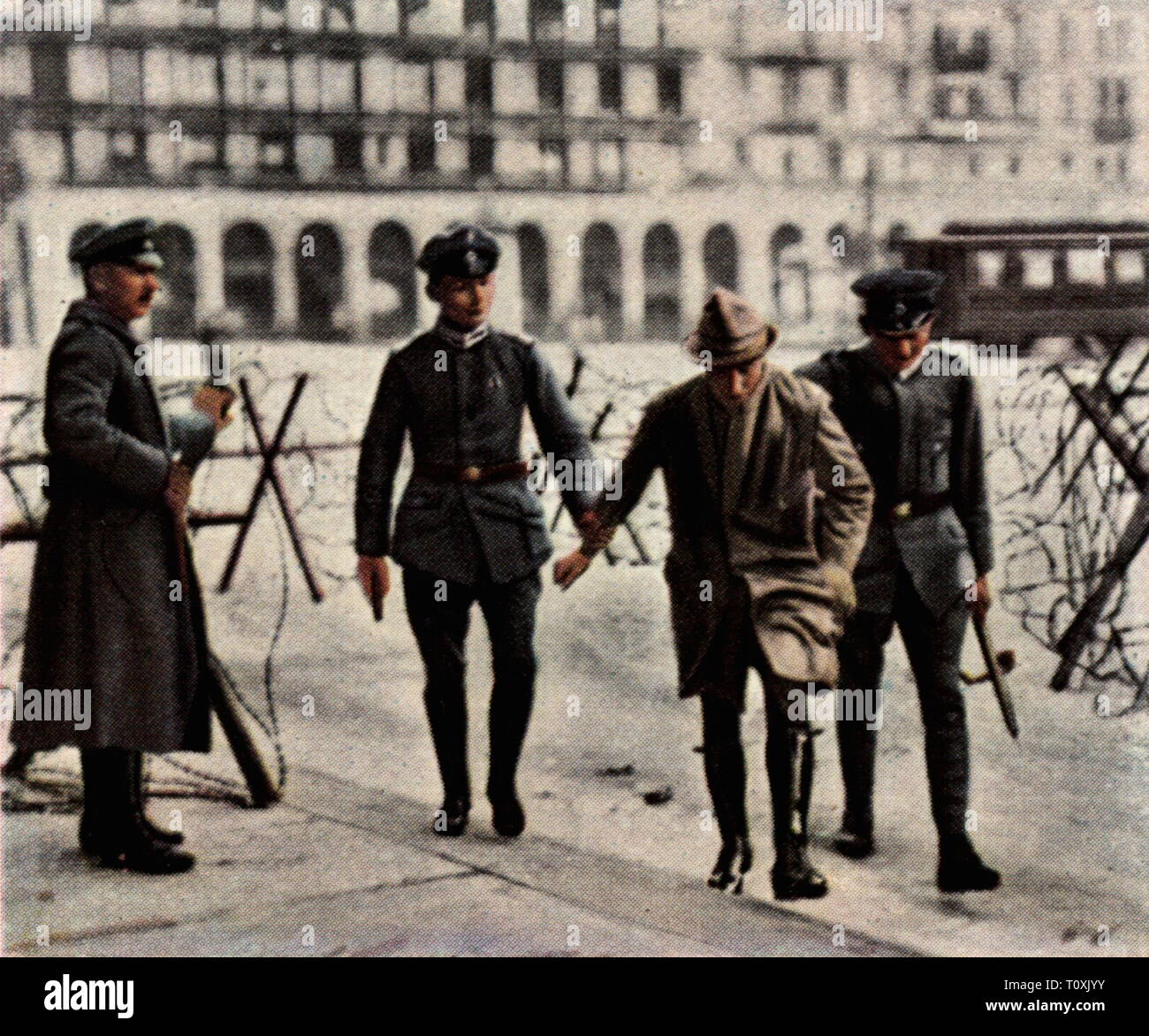Riots in Hamburg, February 1921, arresting a ringleader, coloured photograph, cigarette card, series 'Die Nachkriegszeit', 1935, police, policemen, policeman, detain, detaining, Germany, German Reich, Third Reich, Weimar Republic, 1920s, 20th century, riot, riots, under arrest, ringleader, gang leader, ringleaders, gang leaders, coloured, colored, post war period, post-war period, post-war years, post-war era, historic, historical, Additional-Rights-Clearance-Info-Not-Available Stock Photo