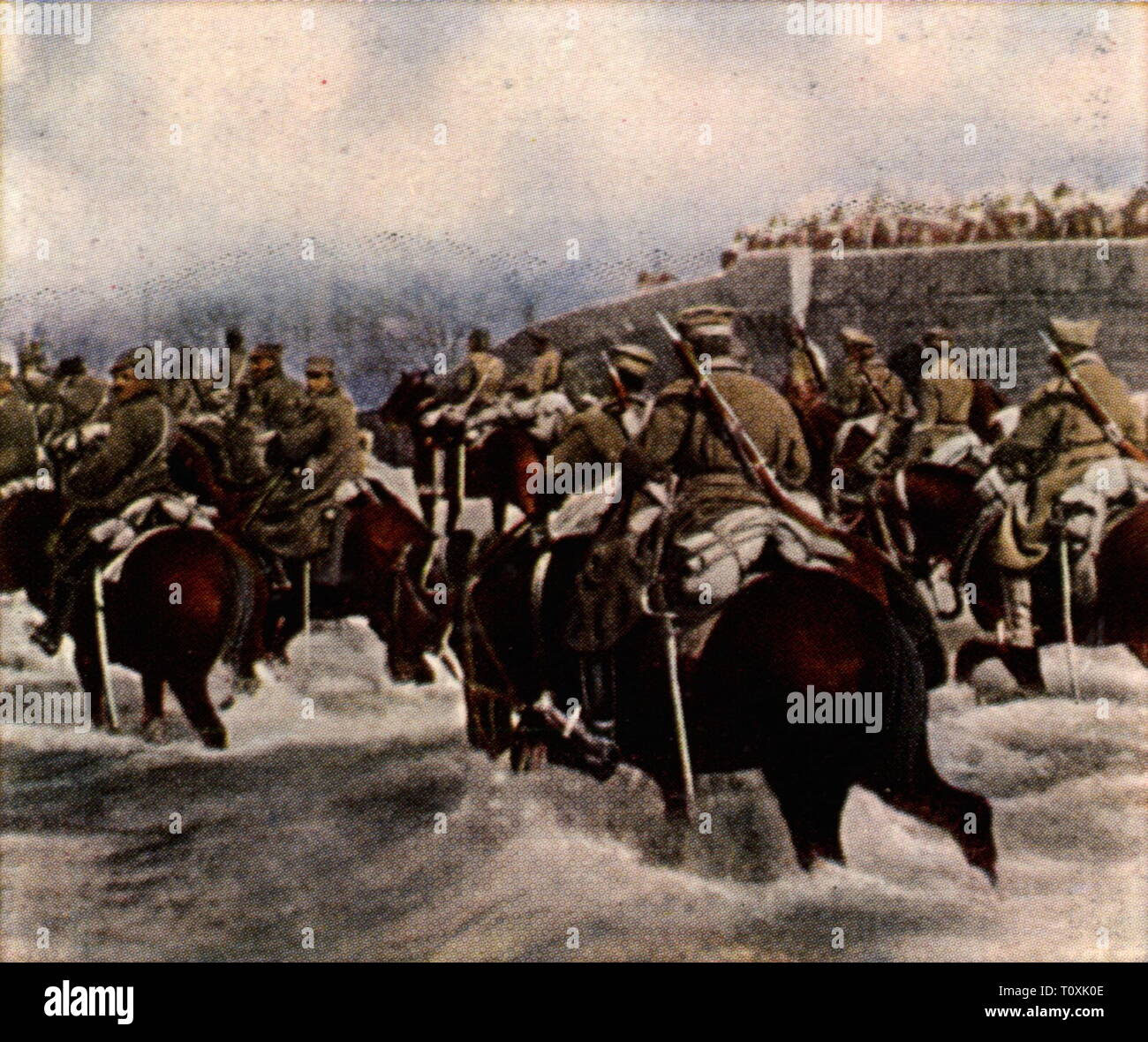 Greco-Turkish War 1919 - 1922, Greek cavalry is crossing a river, coloured photograph, cigarette card, series 'Die Nachkriegszeit', 1935, Greco - Turkish, horseman, horsemen, cavalryman, cavalrymen, horse, horses, soldiers, soldier, military, Greece, Turkey, Anatolia, people, 1920s, 20th century, war, wars, Greek, Grecian, cavalry, cavalries, crossing, cross, river, rivers, coloured, colored, post war period, post-war period, post-war years, post-war era, historic, historical, Additional-Rights-Clearance-Info-Not-Available Stock Photo
