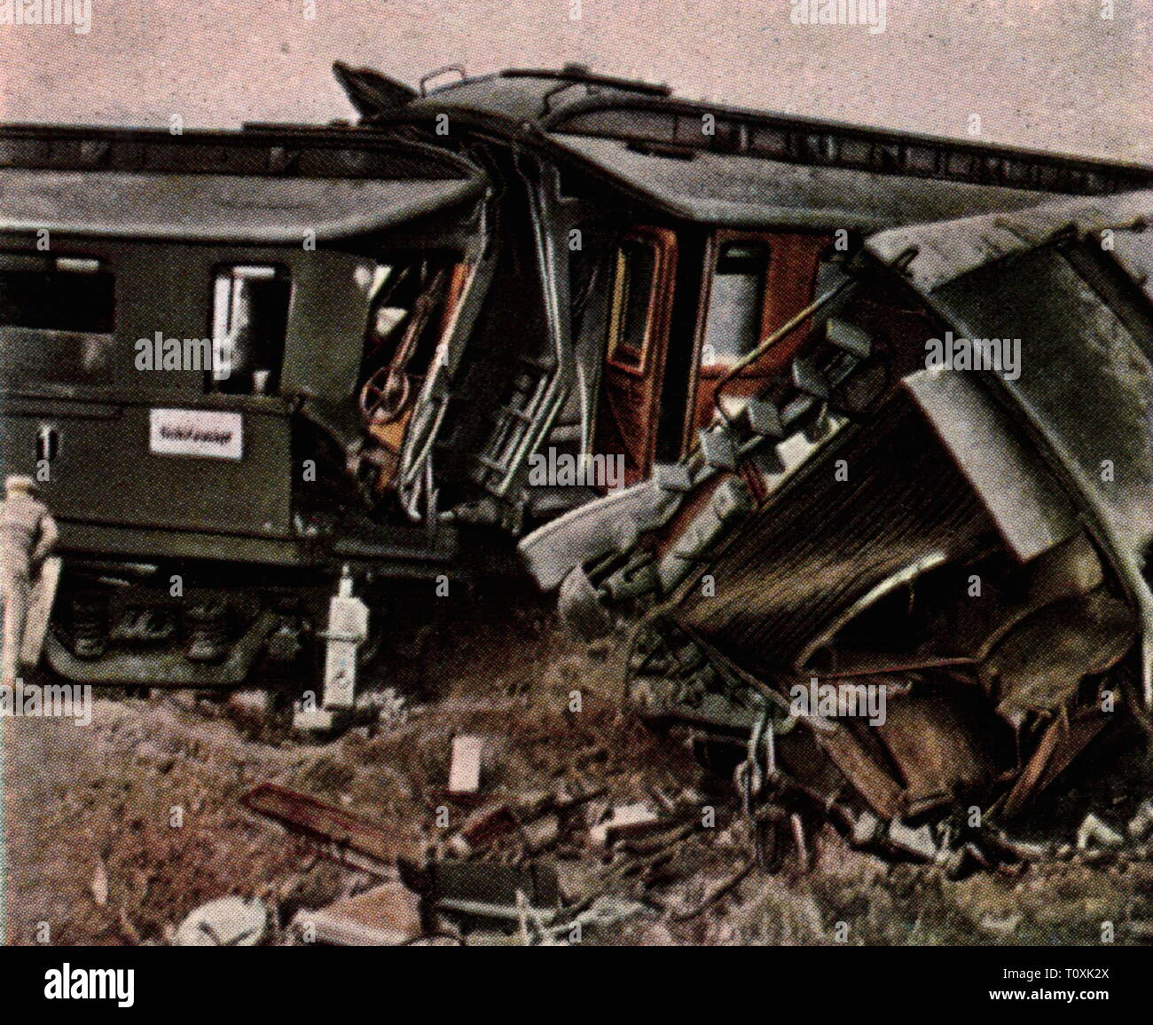transport / transportation, railway, disasters, railway accident of Siegelsdorf, 10.6.1928, coloured photograph, cigarette card, series 'Die Nachkriegszeit', 1935, German State Railroad, Reichsbahn, German State Railways, railway accident, railway accidents, crash, crashes, derailment, derailed, wagon, the Free State of Bavaria, Franconia, Germany, German Reich, Weimar Republic, 1920s, 20th century, transport, transportation, railway, railroad, railways, railroads, disaster, disasters, coloured, colored, post war period, post-war period, post-war, Additional-Rights-Clearance-Info-Not-Available Stock Photo