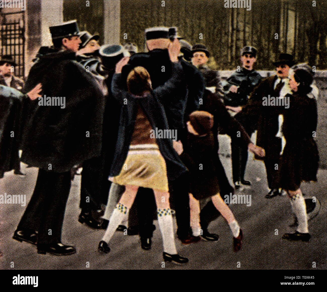 politics, demonstrations, France, demonstrations due to the banking crisis, police is assaulted by children, Paris, July 1931, coloured photograph, cigarette card, series 'Die Nachkriegszeit', 1935, world depression, world depressions, violence, protest, protests, financial scandal, economic crisis, economic crunch, economic crises, economic crunches, bank, banks, rage, anger, fury, Third Republic, people, 20th century, 1930s, politics, policy, demonstrations, demos, demonstration, demo, due to, owing to, owing the fact that, children, child, kid, Additional-Rights-Clearance-Info-Not-Available Stock Photo