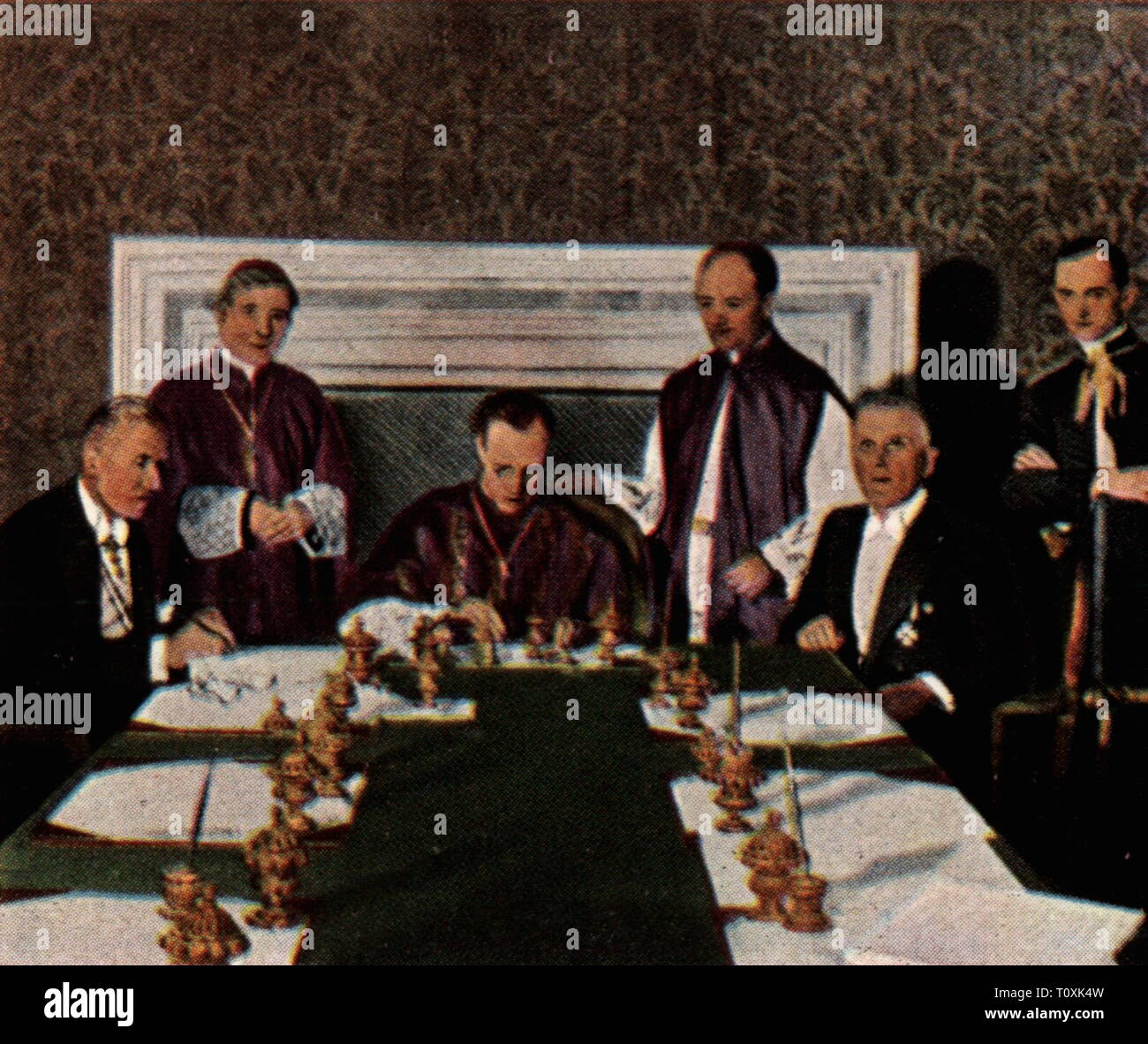 politics, treaties, Reich Concordat 1933, signing, from left: prelate Ludwig Kaas, vice chancellor Franz von Papen, undersecretary Giuseppe Pizzardo, papal secretary of state Eugenio Pacelli, substitute Alfredo Ottaviani, head of department Rudolf Buttmann, Vatican, 20.7.1933, coloured photograph, cigarette card, series 'Die Nachkriegszeit', 1935, politics, foreign policy, external policy, religious policy, concordat, Papal States, The Holy See, Roman Catholic Church, Roman, Catholic, clergy, politician, politicians, National Socialism, Nazi, Naz, Additional-Rights-Clearance-Info-Not-Available Stock Photo