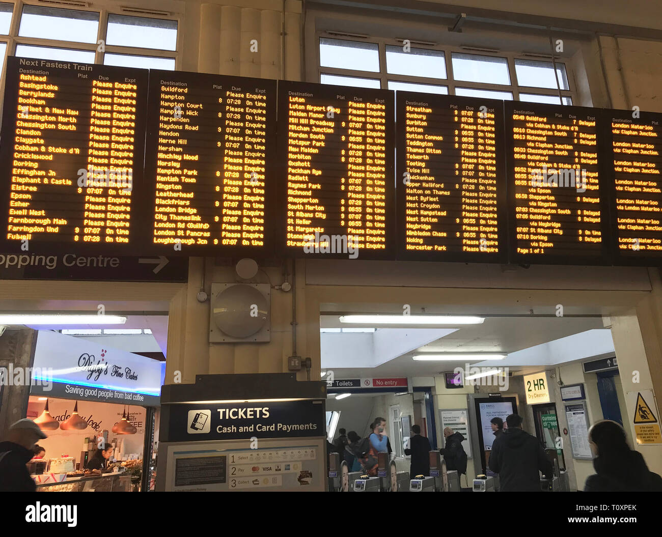 Departure screens at Wimbledon train station in London as overrunning engineering work at London Waterloo, the UK's busiest railway station, has caused major rush hour disruption. Stock Photo