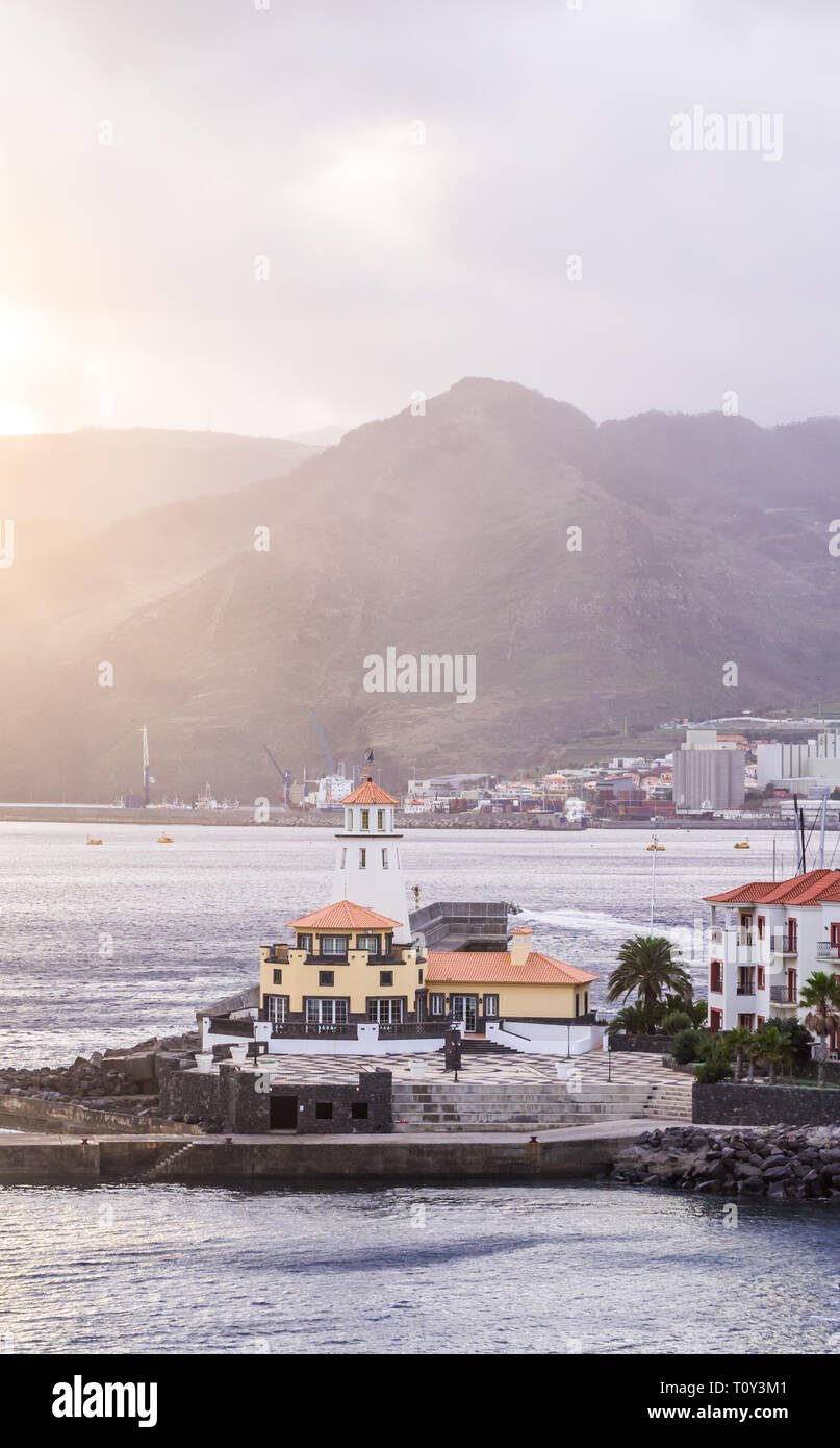 Lighthouse in Canical, a town in the Madeira island, Portugal, at sunset. Stock Photo