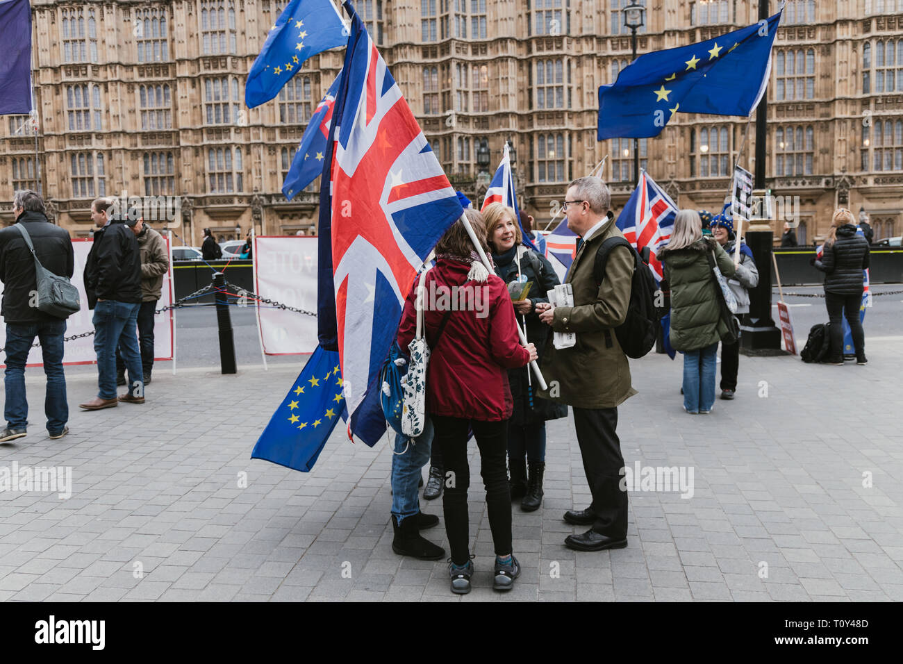 LONDON - MARCH 20, 2019: People signs and flag at Brexit protest in Westminster London Stock Photo