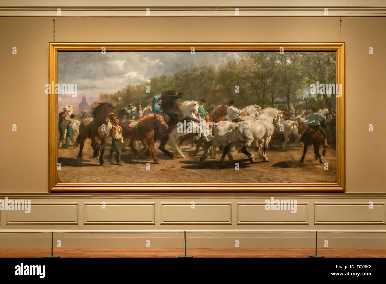 The Horse Fair is an oil on canvas painting by Rosa Bonheur on display at the Metropolitan Museum of Art in New York City. Stock Photo