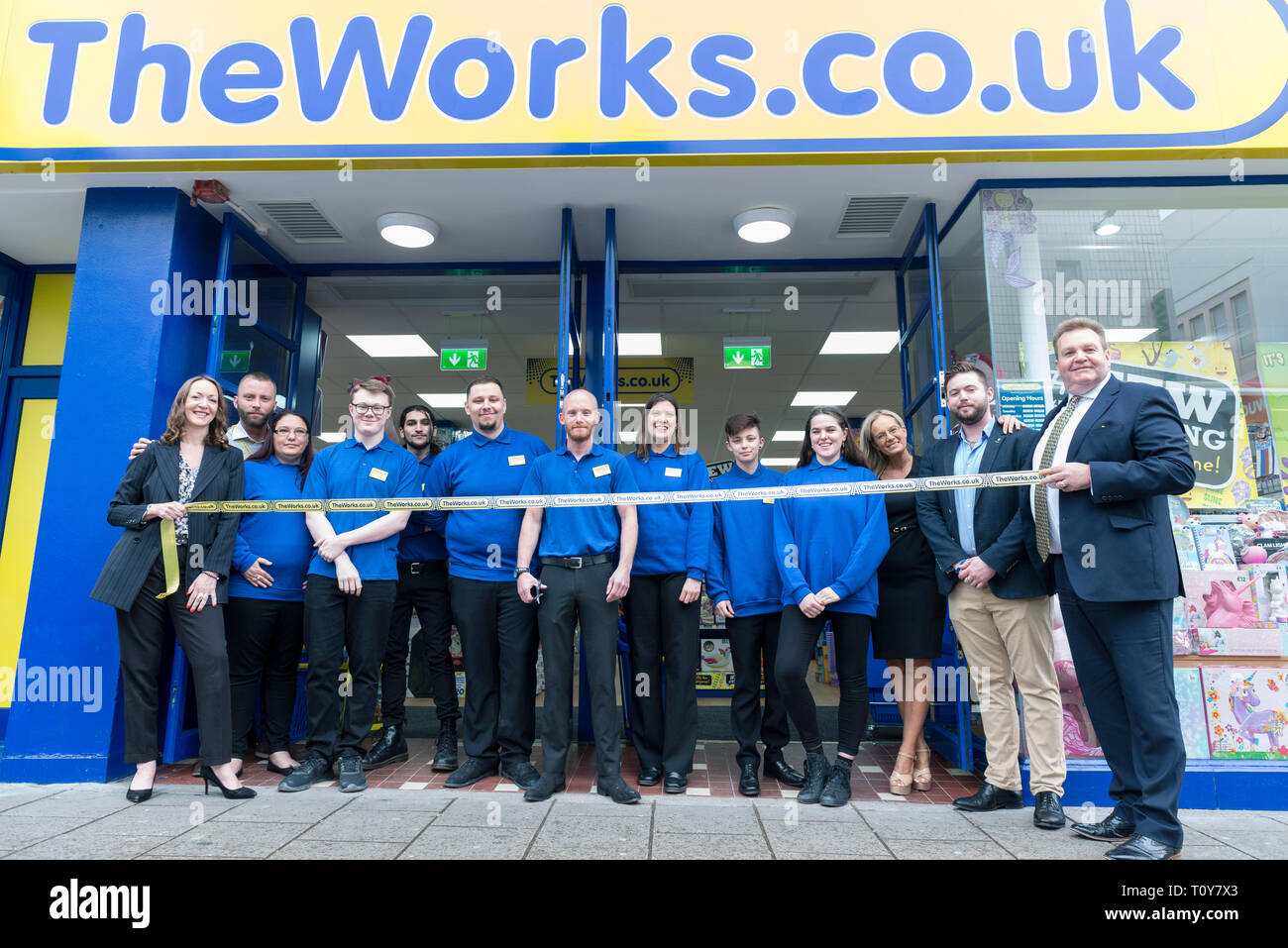 the grand opening of a shop from The Works with the ribbon cutting taking place Stock Photo