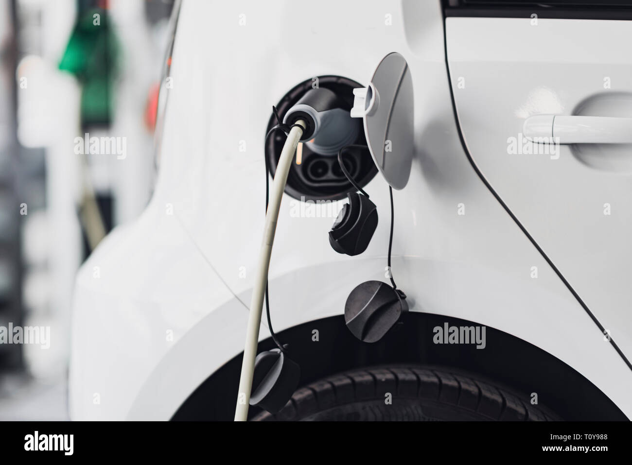 Electric car charging Stock Photo Alamy