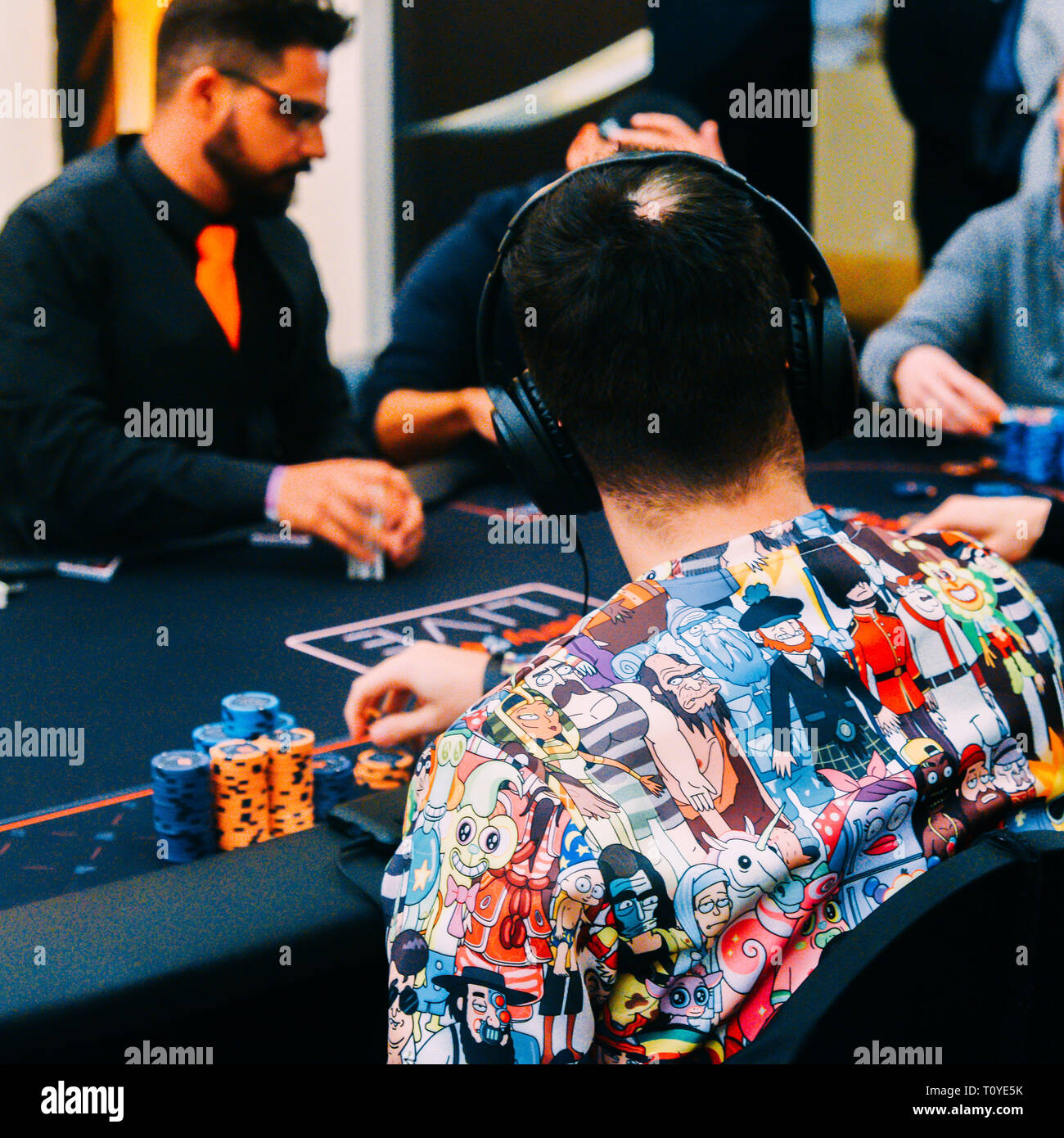 Rio de Janeiro, Brazil - March 21st, 2019: Poker Player with a colourful shirt at the Main Event of the PartyPoker LIVE MILLIONS South America 2019 occuring at the luxurious Copacabana Palace Belmond Hotel in Rio de Janeiro, Brazil from March 15th through March 24th, 2019. Credit: Alexandre Rotenberg/Alamy Live News Stock Photo