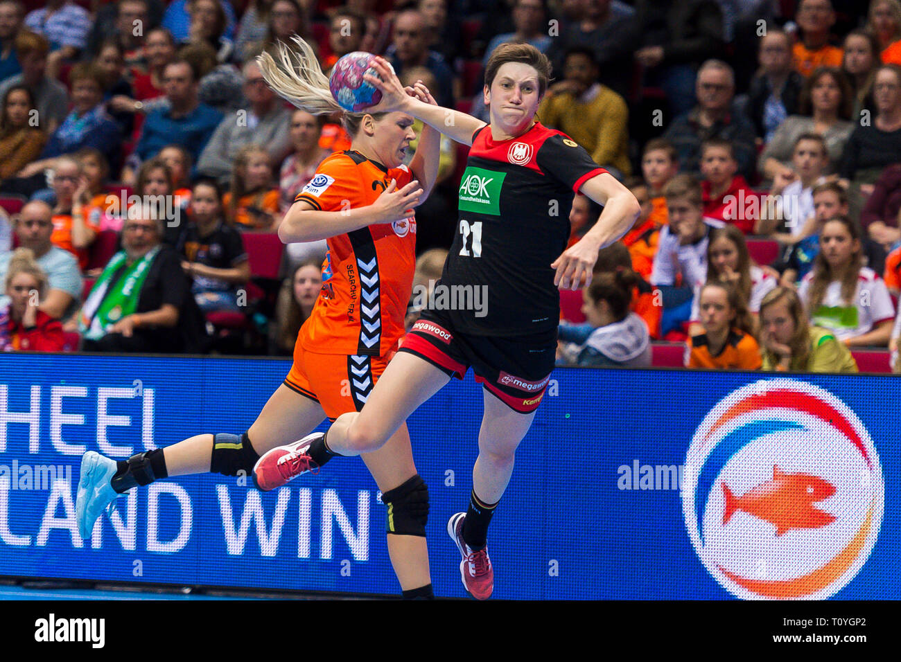Groningen, Netherlands. 22nd Mar, 2019. Handball, women: International, Netherlands - Germany: Ina Grossmann (front) from Germany in action. Credit: Marco Wolf/wolf-sportfoto/dpa/Alamy Live News Stock Photo