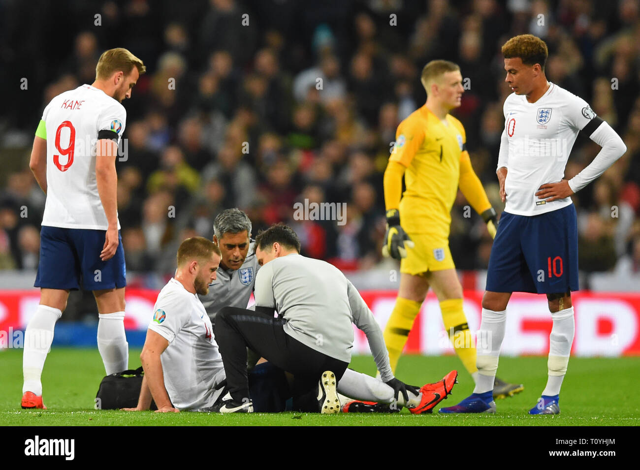 London, UK. 22nd Mar, 2019. England midfielder Eric Dier goes down injures whilst his Spurs teammates look on worried during the UEFA European Championship Group A Qualifying match between England and Czech Republic at Wembley Stadium, London on Saturday 23rd March 2019. (Credit: Jon Bromley | MI News ) Credit: MI News & Sport /Alamy Live News Stock Photo
