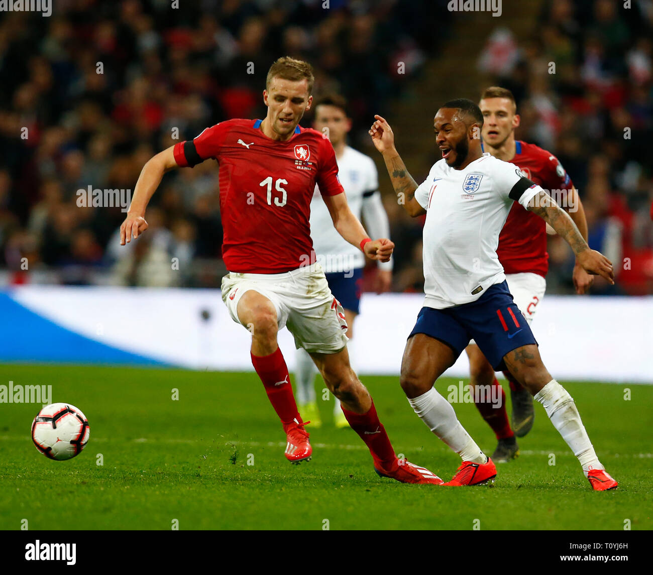 London, UK. 22nd Mar 2019. L-R Tomas Soucek of Czech Republic and Raheem Sterling of England during European Championship Qualifying between England and Czech Republic at Wembley stadium, London, England on 22 Mar 2019 Credit: Action Foto Sport/Alamy Live News Stock Photo