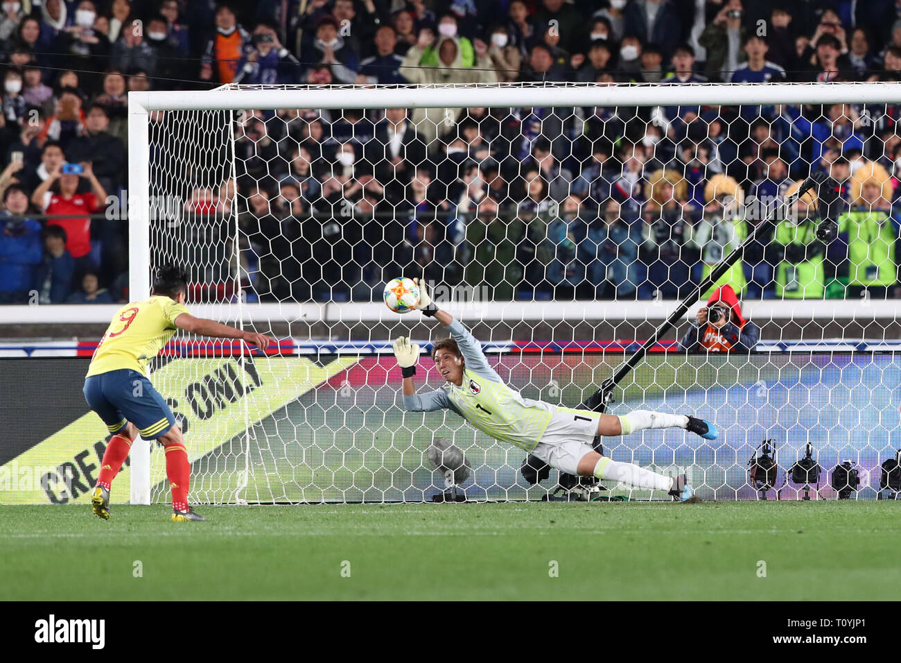 Kanagawa, Japan. 22nd Mar, 2019. (L-R) Radamel Falcao (COL), Masaaki Higashiguchi (JPN) Football/Soccer : KIRIN Challenge Cup 2018 match between Japan 0-1 Colombia at Nissan Stadium in Kanagawa, Japan . Credit: Yohei Osada/AFLO SPORT/Alamy Live News Stock Photo