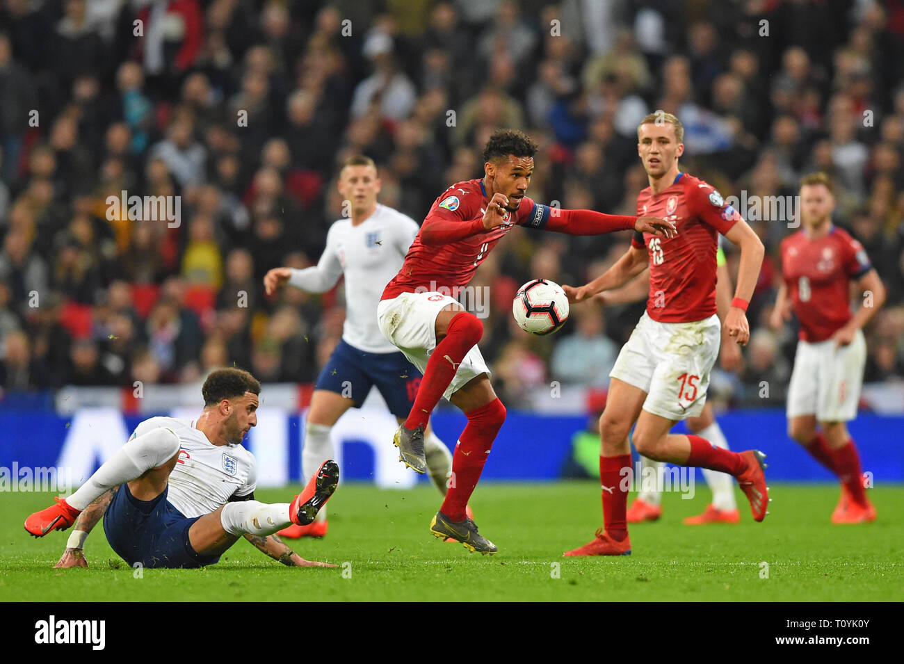 London, UK. 22nd Mar 2019. Czech Republic defender Theodor Gebre Selassie controls the ball from England defender Kyle Walker during the UEFA European Championship Group A Qualifying match between England and Czech Republic at Wembley Stadium, London on Saturday 23rd March 2019. (Credit: Jon Bromley | MI News ) Credit: MI News & Sport /Alamy Live News Stock Photo