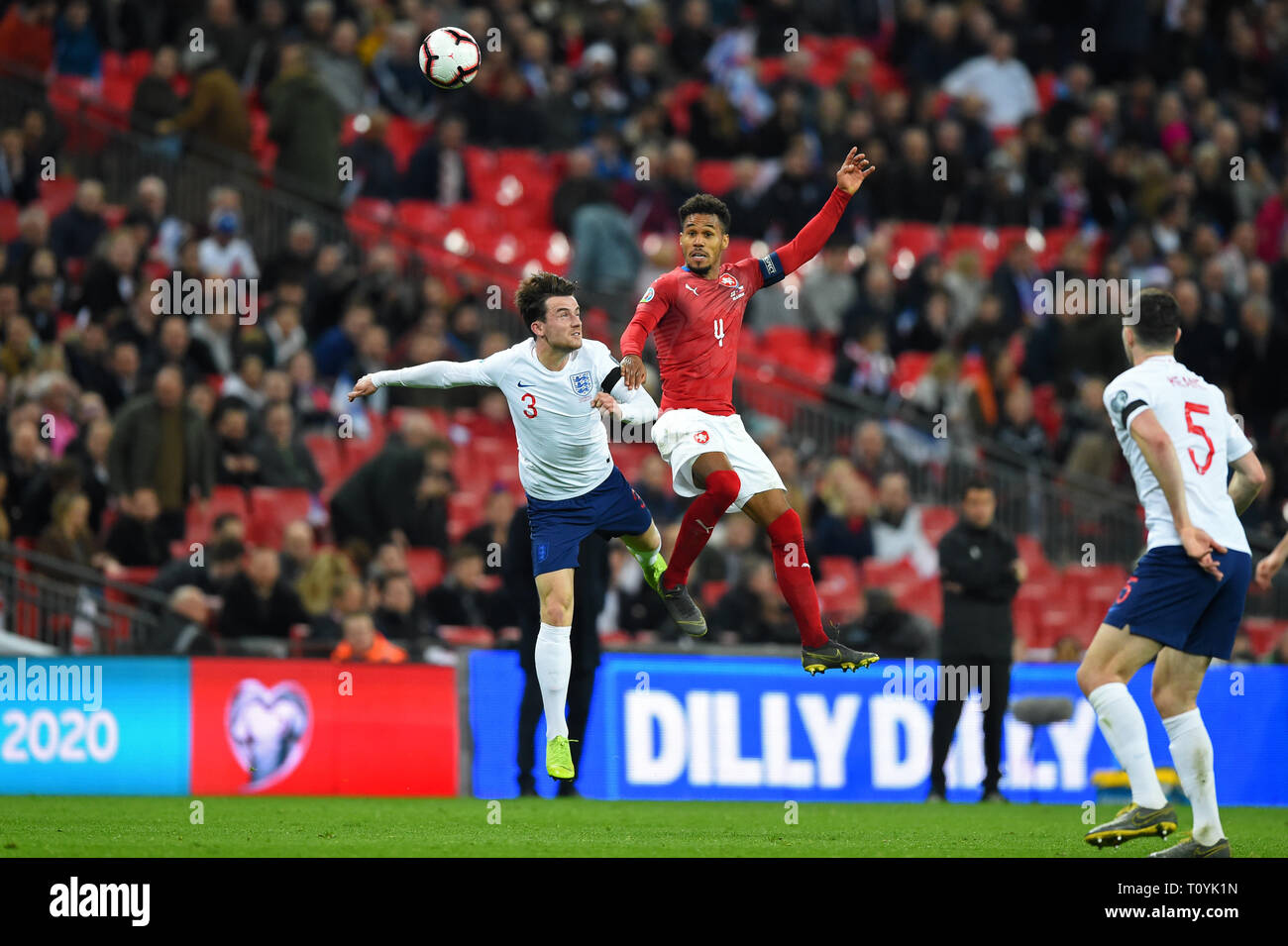 London, UK. 22nd Mar 2019. England defender Ben Chilwell battles in the air with Czech Republic defender Theodor Gebre Selassie during the UEFA European Championship Group A Qualifying match between England and Czech Republic at Wembley Stadium, London on Saturday 23rd March 2019. (Credit: Jon Bromley | MI News ) Credit: MI News & Sport /Alamy Live News Stock Photo