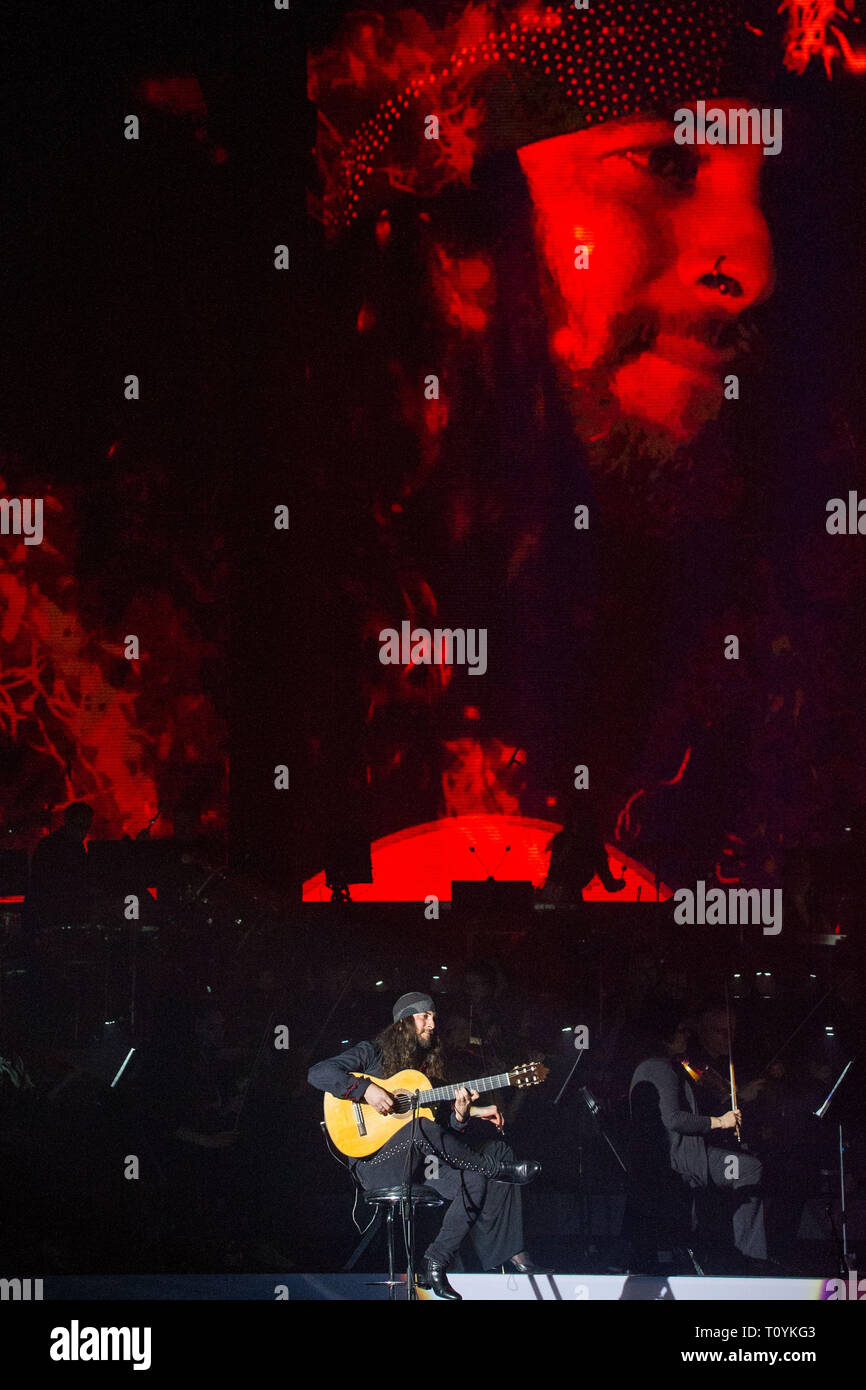 Glasgow, UK. 22 March 2019. Pictured: Amir John Haddad - El Amir playing guitar. Under the direction of Gavin Greenaway, Hans Zimmer’s soundtrack conductor and a large symphony orchestra will deliver an intense and unforgettable concert experience in arenas around the country.  In contrast to the renowned “Hans Zimmer Live” tour, where the sound focuses on Zimmer’s band and the electronic sounds of the music, “The World of Hans Zimmer – A Symphonic Celebration” will present the composer’s works arranged for a live symphony orchestra for the very first time. Credit: Colin Fisher/Alamy Live News Stock Photo