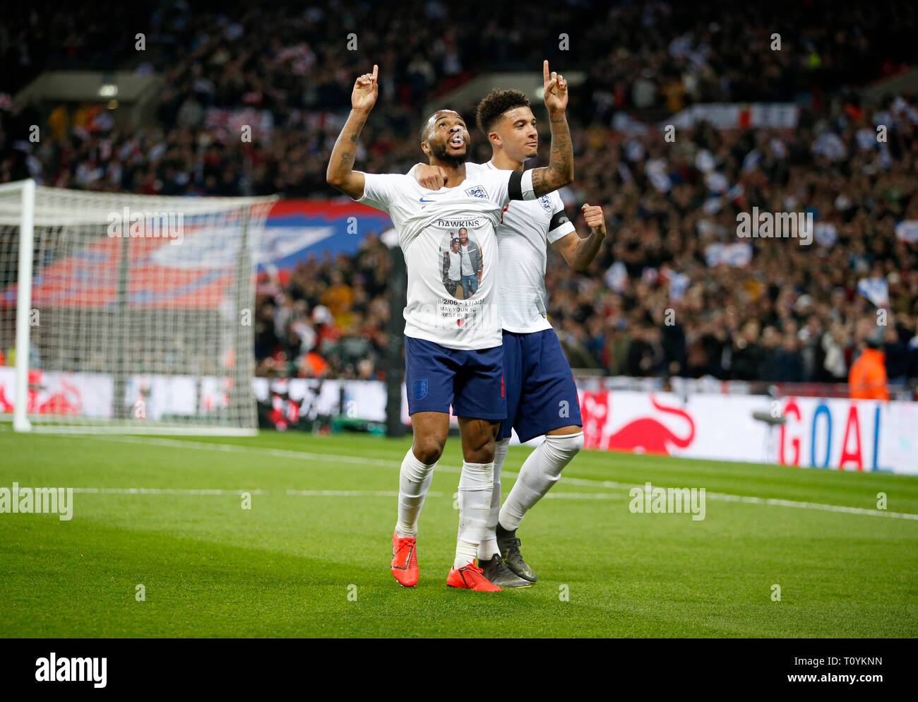 London, UK. 22nd Mar, 2019. England's Raheem Sterling (L) celebrates scoring during the Euro 2020 qualifying Group A match between England and Czech Republic at Wembley Stadium in London, Britain on March 22, 2019. England won 5-0. FOR EDITORIAL USE ONLY. NOT FOR SALE FOR MARKETING OR ADVERTISING CAMPAIGNS. NO USE WITH UNAUTHORIZED AUDIO, VIDEO, DATA, FIXTURE LISTS, CLUB/LEAGUE LOGOS OR "LIVE" SERVICES. ONLINE IN-MATCH USE LIMITED TO 45 IMAGES, NO VIDEO EMULATION. NO USE IN BETTING, GAMES OR SINGLE CLUB/LEAGUE/PLAYER PUBLICATIONS. Credit: Matthew Impey/Xinhua/Alamy Live News Stock Photo