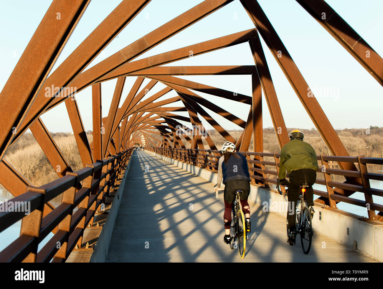 Madrid, Iowa, USA. 22nd Mar, 2019. Originally a conduit for rail freight, but now a decomissioned railroad line, the High Trestle Trail Bridge is part of the 25-mile Trestle Trail path for bikers, hikers and horseback riders. The artistic, spiral steel frames springing up from the road bed are a nod to the shape of the timbers placed in former central Iowa coal mines. Credit: Brian Cahn/ZUMA Wire/Alamy Live News Stock Photo