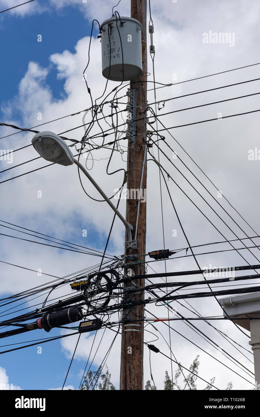 Lamp post with mass of wires, Bridgetown, St Michael Parish, Barbados, Lesser Antilles, Caribbean Stock Photo