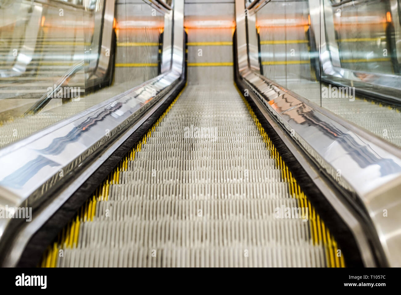 Mechanical escalators for people up and down, access detail Stock Photo ...