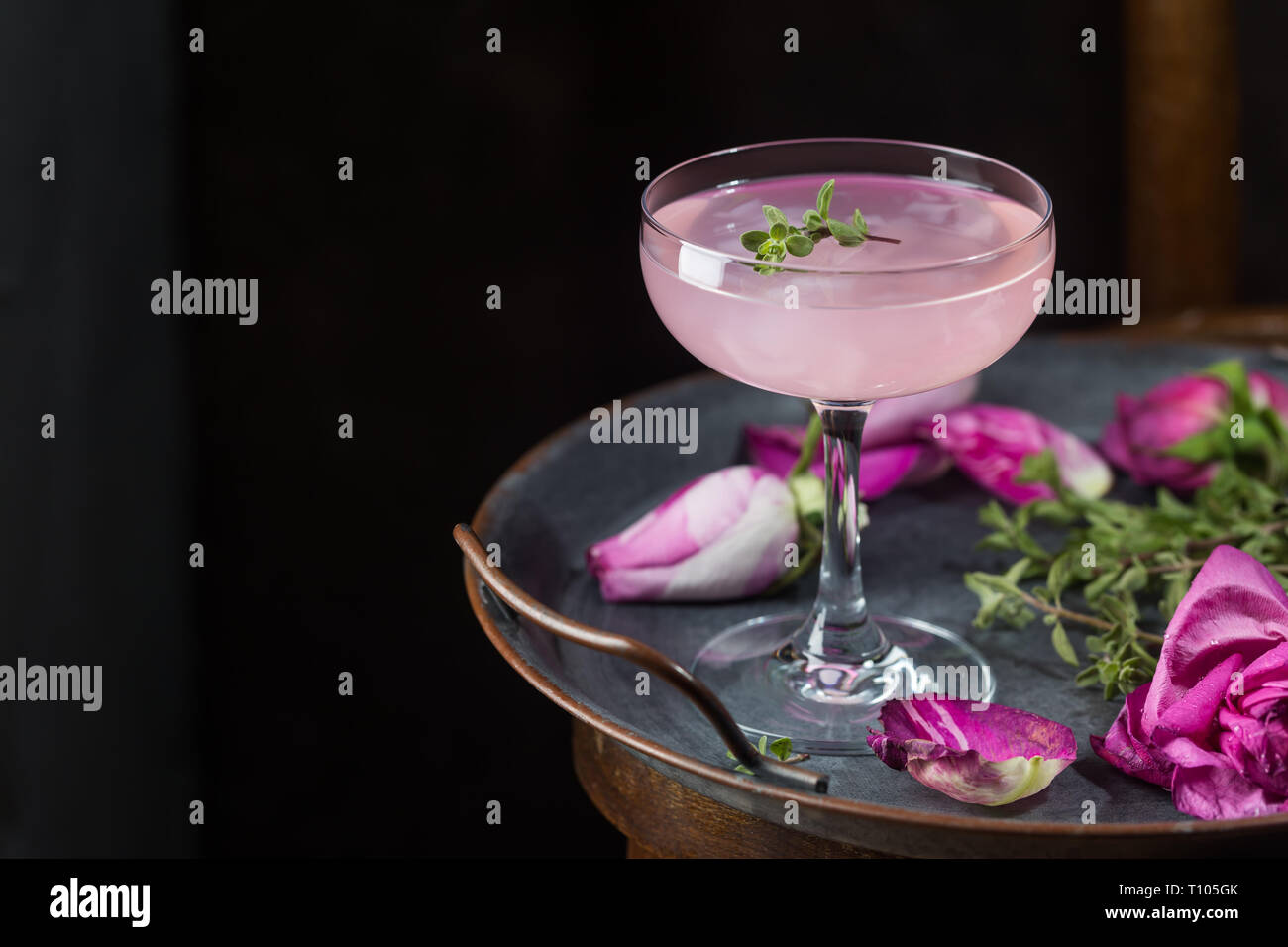 Summer refreshment drinks. Light pink rose cocktail, with rose wine on