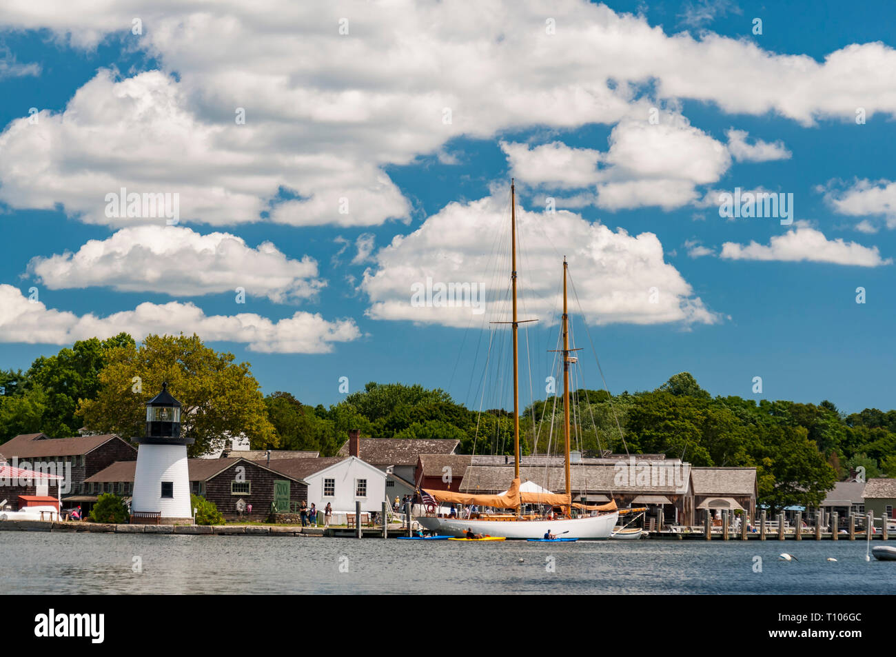 View of the Mystic Seaport with boats and houses, Connecticut Stock
