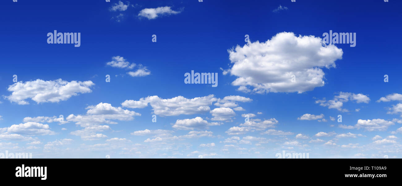 Cloudscape panorama - Blue sky and white clouds Stock Photo - Alamy