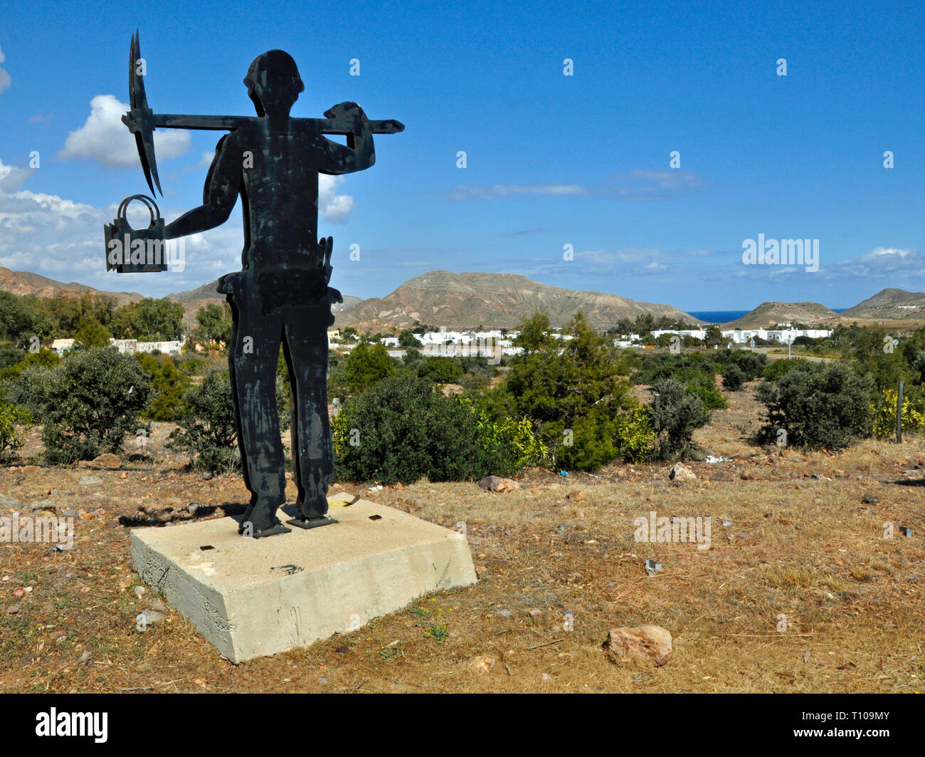 Sculpture of gold miner at the entrance to the village of Rodalquilar, an old gold mining town in Almeria, later used as a Hollywood film location. Stock Photo