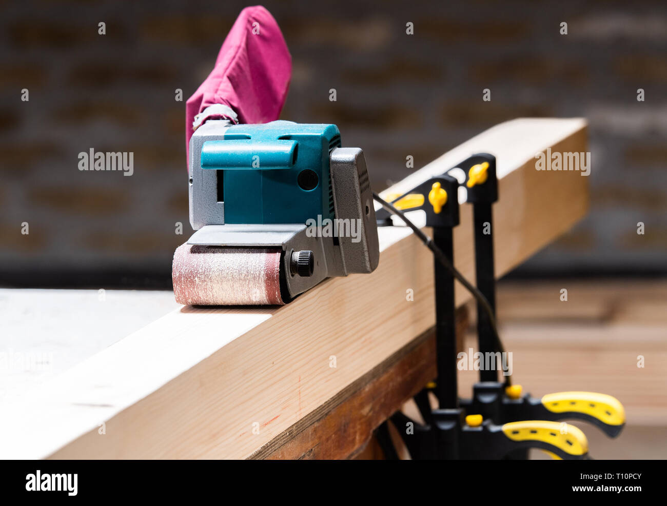 Wood sanding machines belt sander Stock Photo Alamy