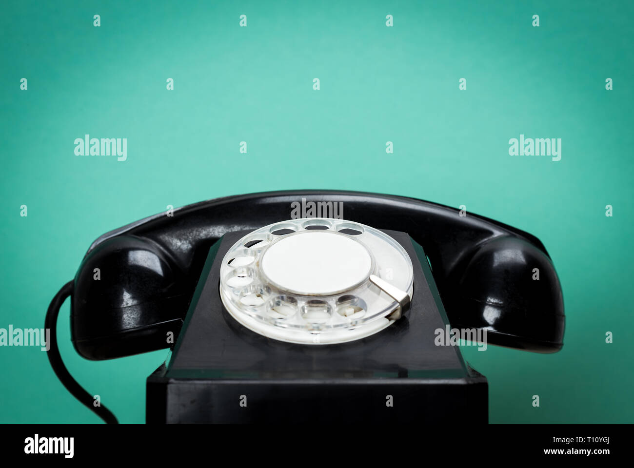 Retro telephone on wood table for old style background Stock Photo - Alamy
