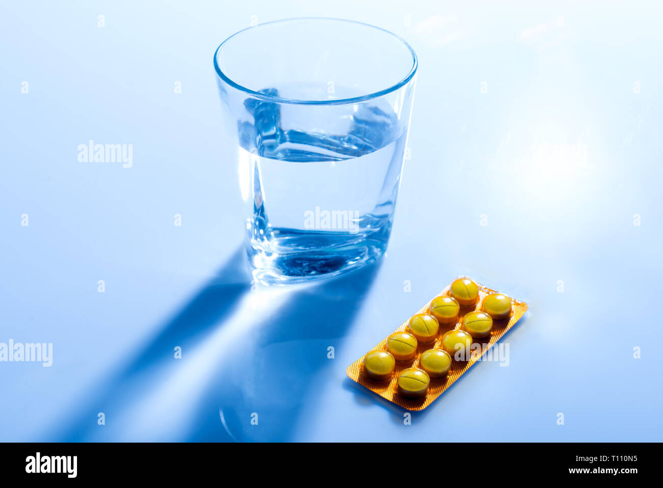 A glass of water with medicine Stock Photo Alamy