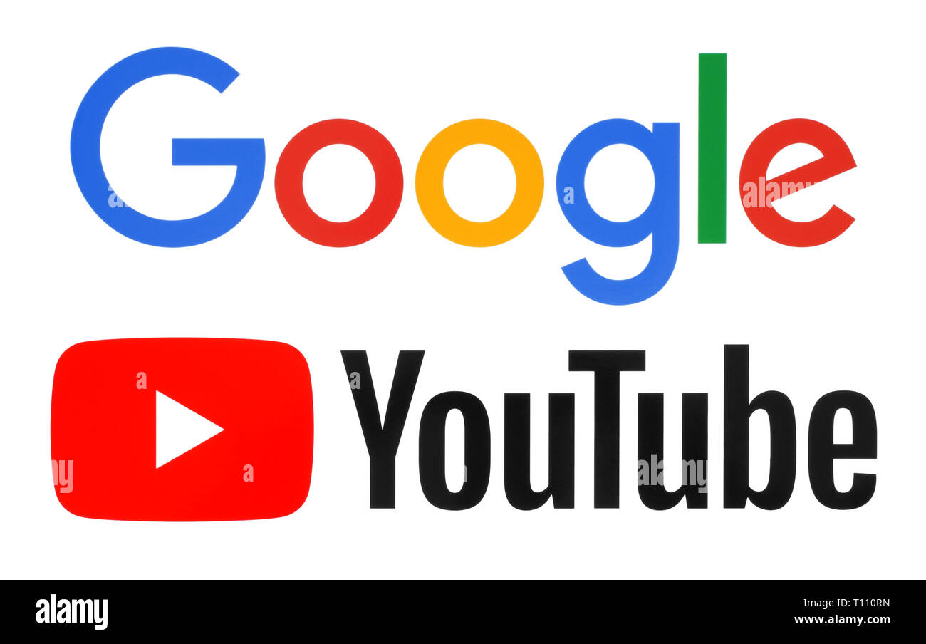 Kiev, Ukraine - December 11, 2018: Google and new Youtube logos printed on white paper. YouTube company was purchased by Google Stock Photo