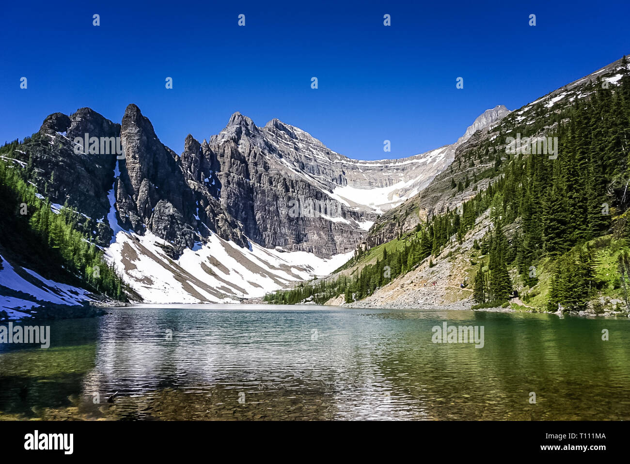 Lake Agnes on Tea House Trail in the Rocky Mountains in Banff National Park in Alberta Canada Stock Photo