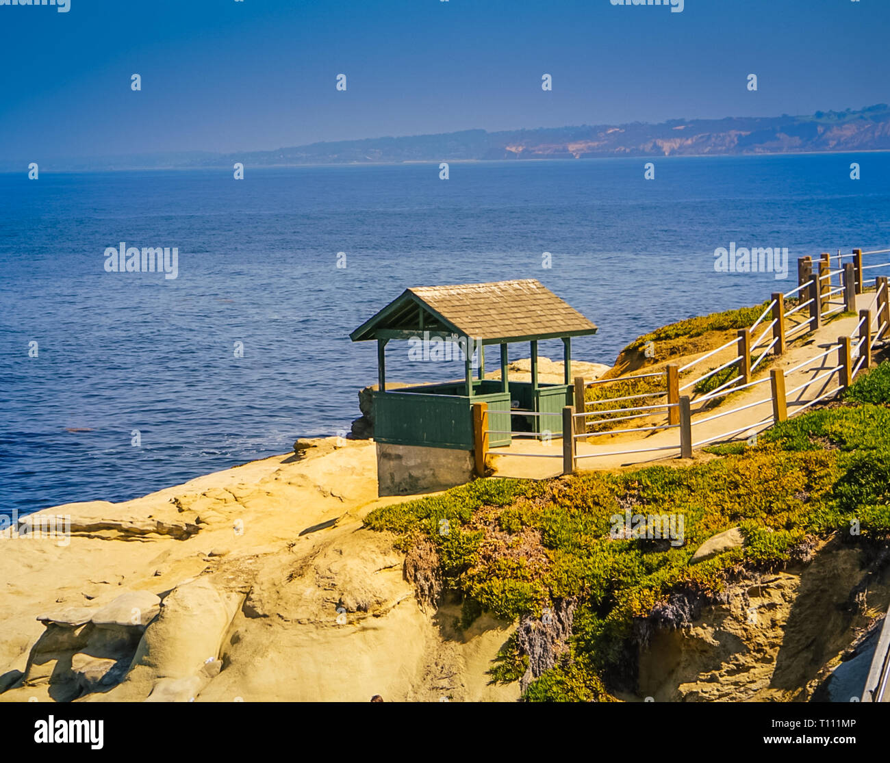 A view off the cliffs of La Jolla Cove and the Pacific Coast Highway near San Diego California Stock Photo