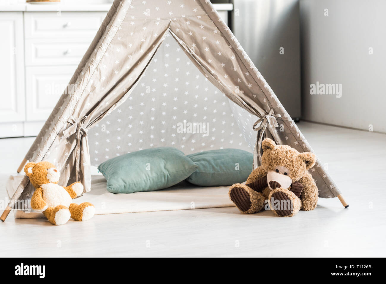 Modern Interior Design Of Nursery Room With Baby Wigwam And Teddy