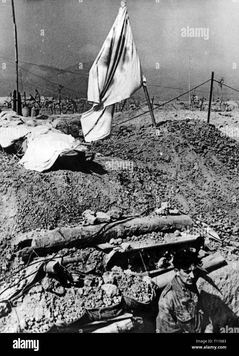 Indochina War 1946 - 1954, Battle of Dien Bien Phu, 13.3. - 7.5.1954, flag of the red cross on the shelter of a field hospital, 26.3.1954, sick bay, sick bays, medical corps organisation, health care, healthcare, dugout, dugouts, Viet Nam, North Vietnam, wars, French Indochina, Indochina, French colony, colonial war, military, army, armies, paratroop, paratroops, paratrooper, Para, paratroopers, Paras, airborne forces, people, France, 20th century, 1950s, battle, battles, flag, flags, cross, crosses, shelter, shelters, combat support hospital, co, Additional-Rights-Clearance-Info-Not-Available Stock Photo