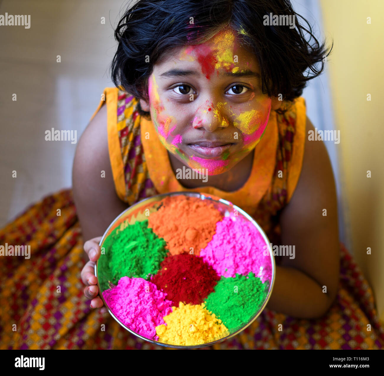 Indian girl celebrating Holi, festival of colours Stock Photo