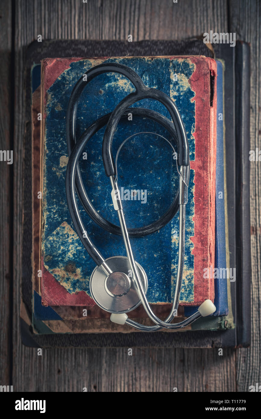 Vintage stethoscope on the pile of old books Stock Photo - Alamy