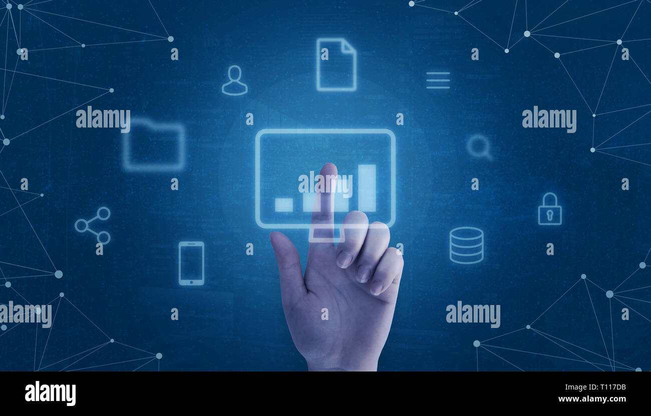 Hand touch computer icon surrounded with internet of things icons concept. Stock Photo