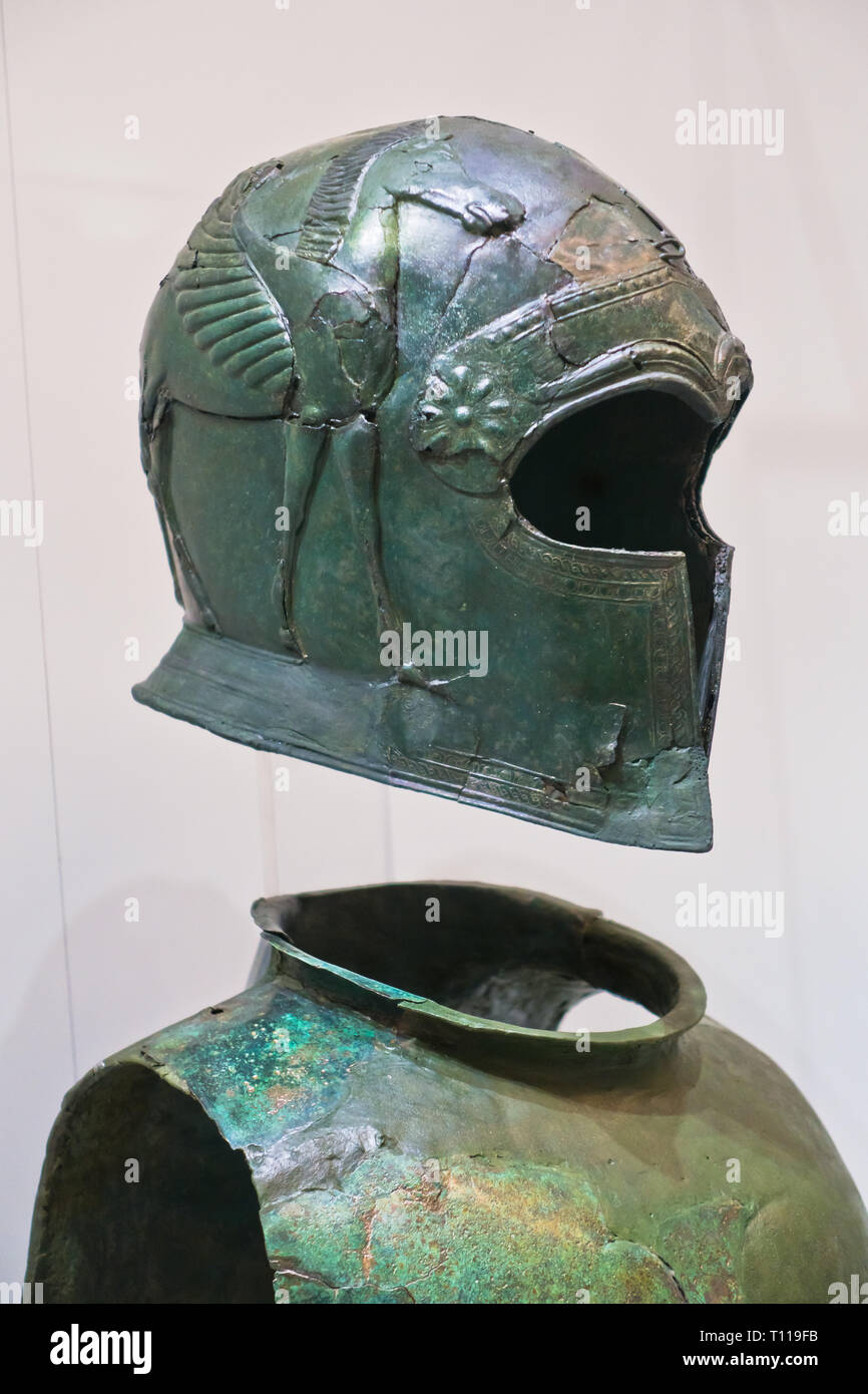 Old greek helmet and armor from bronze age, found near Heraklion, island of  Crete, Greece Stock Photo - Alamy