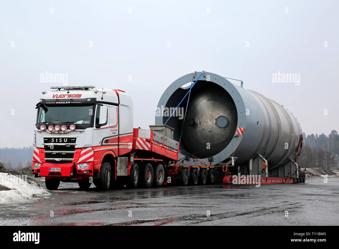 Forssa, Finland - March 16, 2019: Sisu Polar Hauler 625 of Vuorsola Oy in front of oversize load silo. Lenght of transport 45 meters, weight 156 Tonne Stock Photo