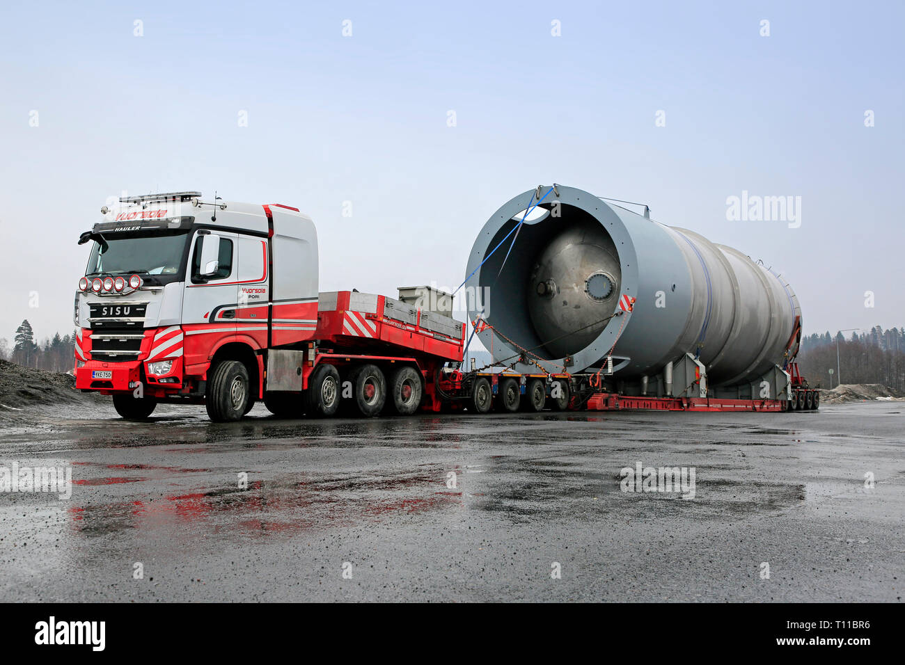 Forssa, Finland - March 16, 2019: Sisu Polar Hauler 625 of Vuorsola Oy in front of oversize load silo. Lenght of transport 45 meters, weight 156 Tonne Stock Photo