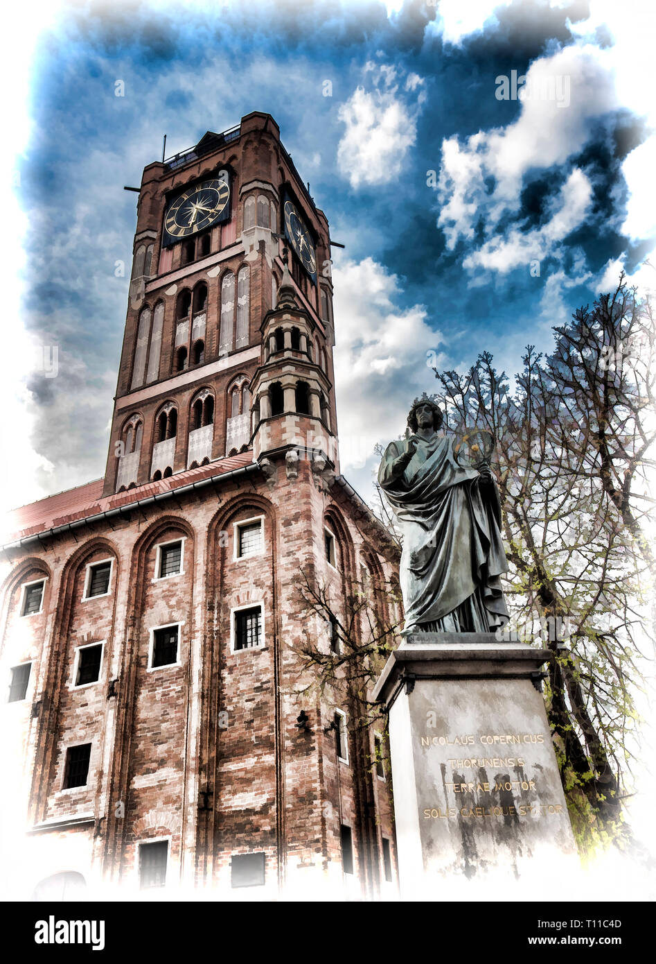Nicolaus Copernicus Statue and City Hall Tower in Torun in Poland. Stock Photo