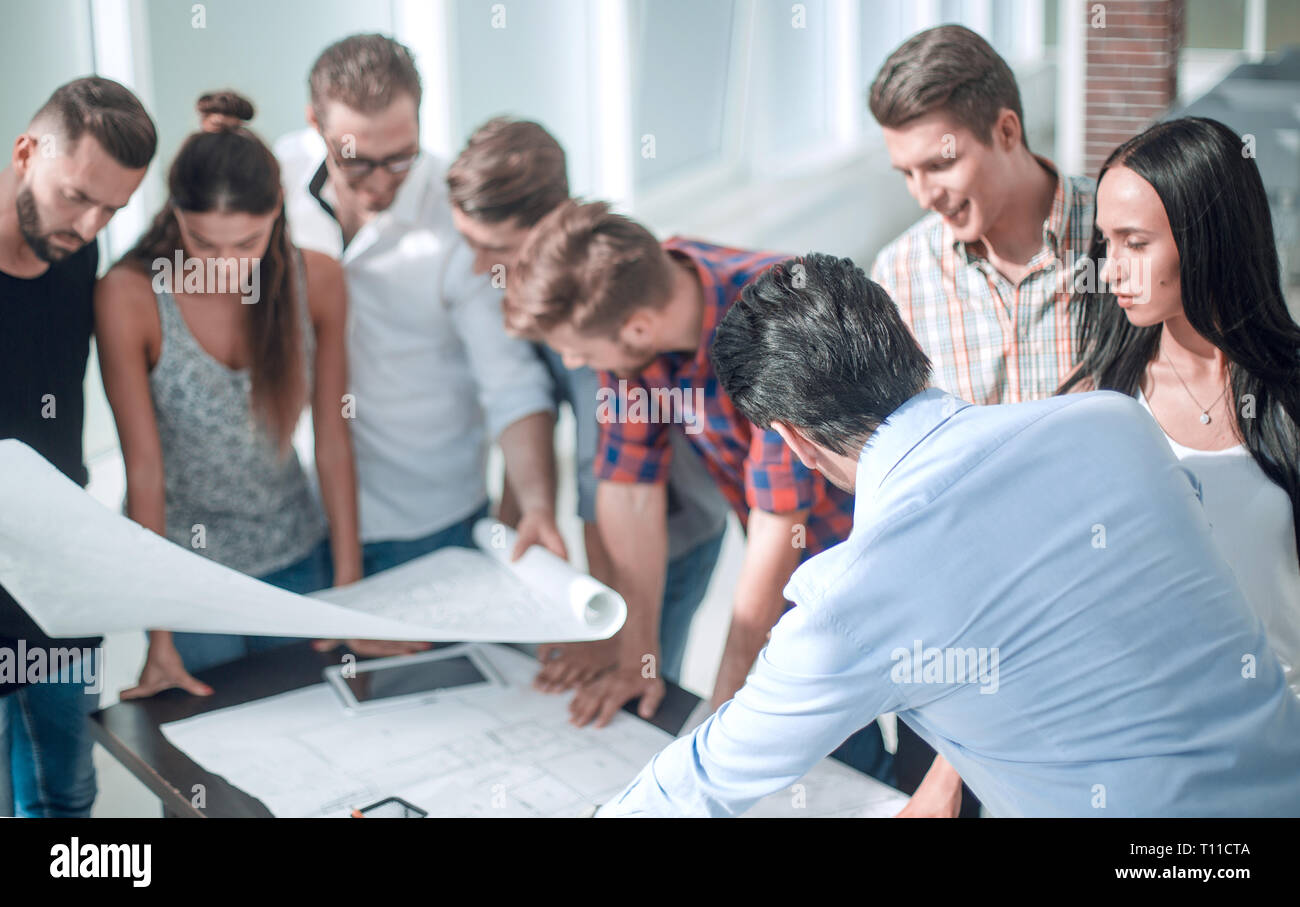 group of designers are discussing a new creative project Stock Photo ...