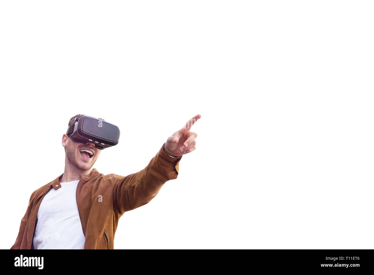 Cheerfully Young Adult Charming Man Using VR Virtual Reality Glasses with Draw Background Stock Photo