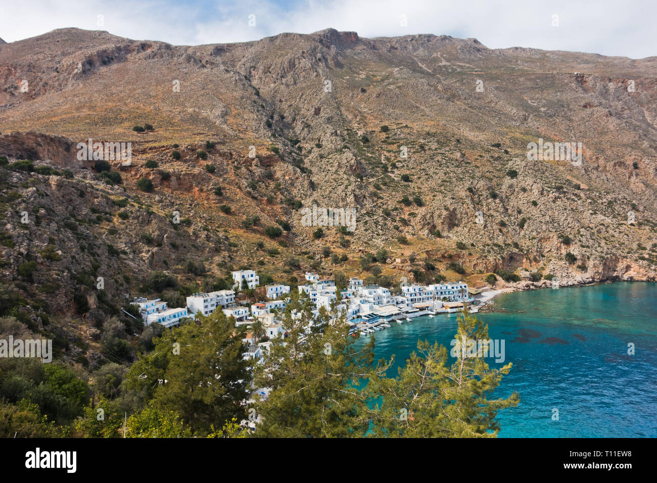Viewpoint from a hiking trail above Loutro bay at sunset, island of Crete, Greece Stock Photo