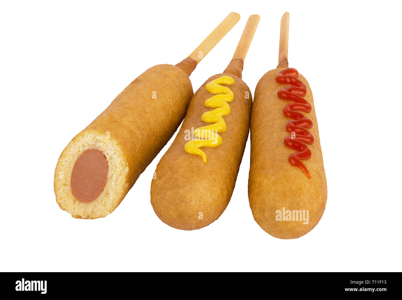 Group of corn dogs isolated on white background. Fast food restaurant concept. Close up. Stock Photo