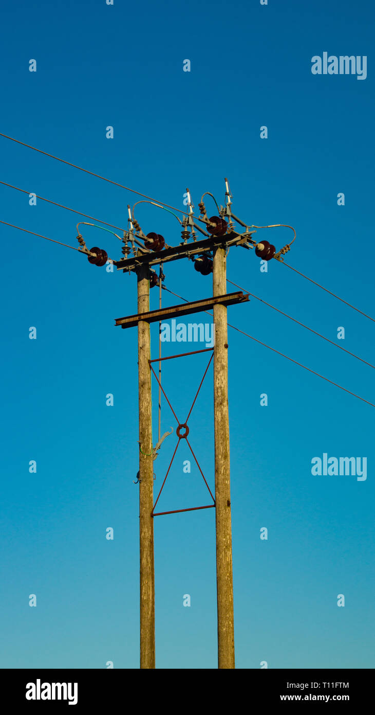 power lines against blue sky Stock Photo - Alamy