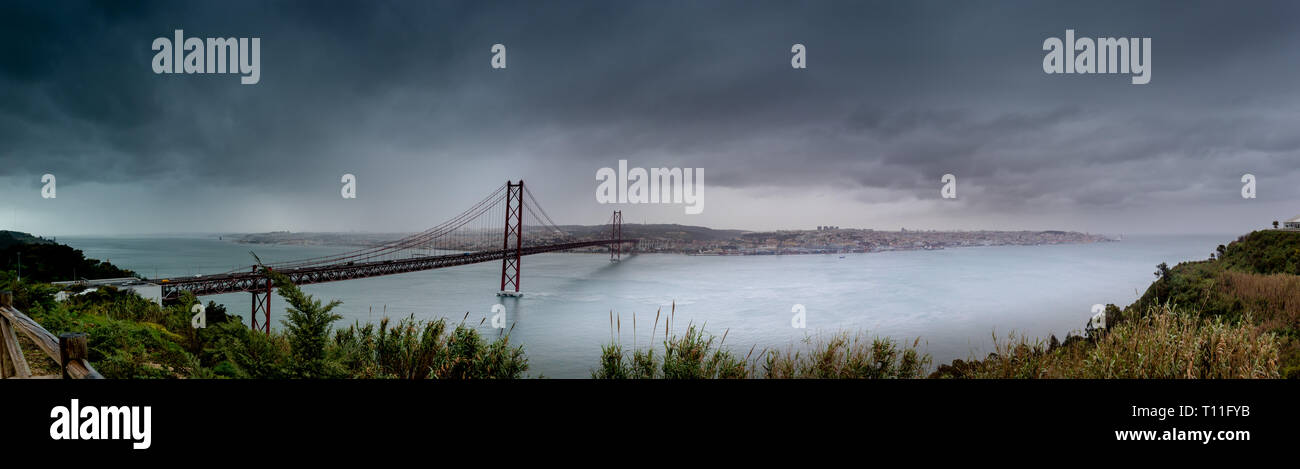 Bridge to Lisbon, named Ponte 25 de Abril, also called the sister bridge of the Golden Gate Stock Photo