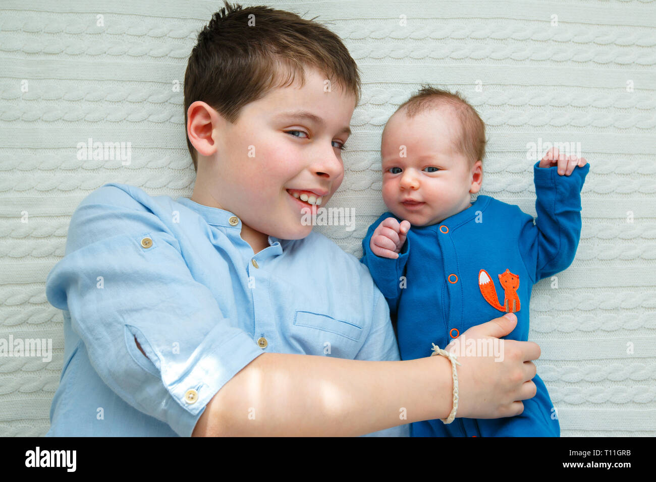Big Brother Hugging His Newborn Baby Toddler Kid Meeting New Sibling Cute Boy And New Born Baby Girl Relax In Bedroom Family With Children At Home Stock Photo Alamy Big Brother Hugging His Newborn Baby Toddler Kid Meeting New Sibling Cute Boy And New Born Baby Girl Relax In Bedroom Family With Children At Home Stock Photo Alamy